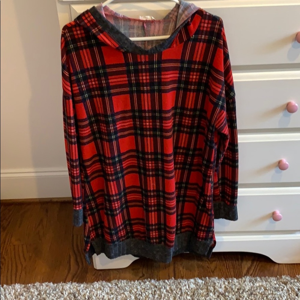 Woman’s plaid sweater dress